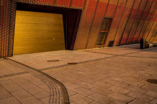 Garage door and entrance to futuristic building