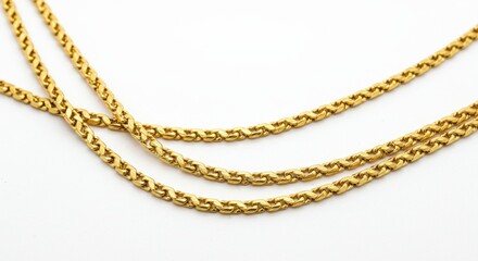Elegant gold chain jewelry on white background