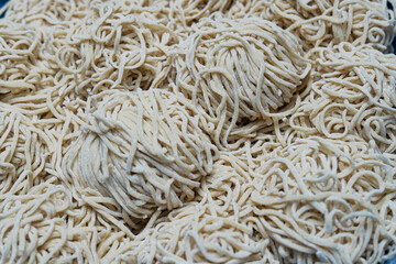 Uncooked homemade noodles, raw, ingredients for chicken noodle menu