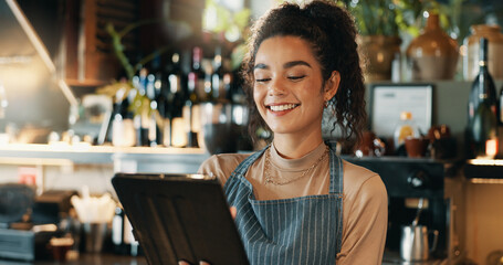 Cafe, woman and happy with tablet for small business, hospitality and tracking stock with tech. Coffee shop, female person and barista with digital for customer service, retail store or alcohol order