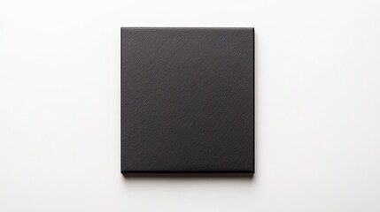 Fototapeta premium Minimalist black canvas on a white background, perfect for artistic displays or photography