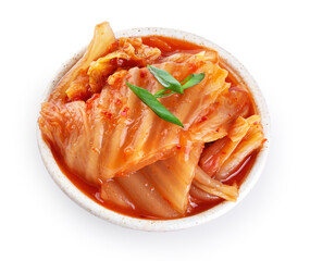 Bowl with korean traditional cabbage kimchi isolated on white background. Hot fermented napa cabbage. With clipping path.