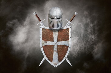 knight's swords shield and helmet on dark background