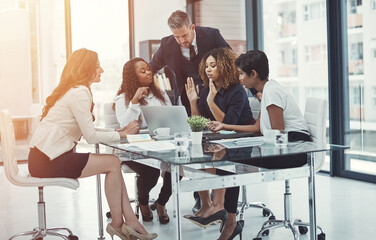 Laptop, group and business people in meeting, problem solving or training in office. Team discussion, development manager and planning project sales, collaboration and research market trends for idea