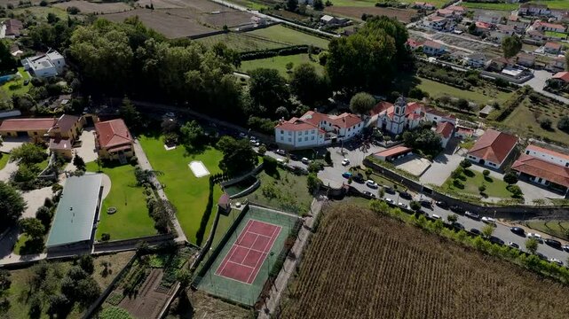 Aerial view of Paroquial de S. Crist&oacute;v&atilde;o Church in Trofa Portugal with surrounding landscape