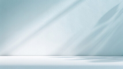 Minimalistic simple background for product presentation. Shadow from plant foliage and light on...