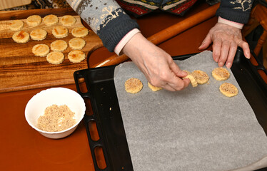 Woman preparing the dough with care and precision during the afternoon hours