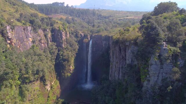 Wide aerial view approaching Libson falls in Drakensberg Mountains, South Africa