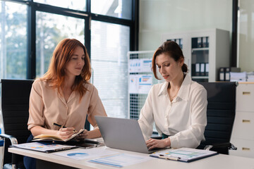 Fototapeta premium Collaboration, strategy, and success in a modern office.