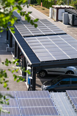 Parking space with solar panels on a roof. Solar canopy