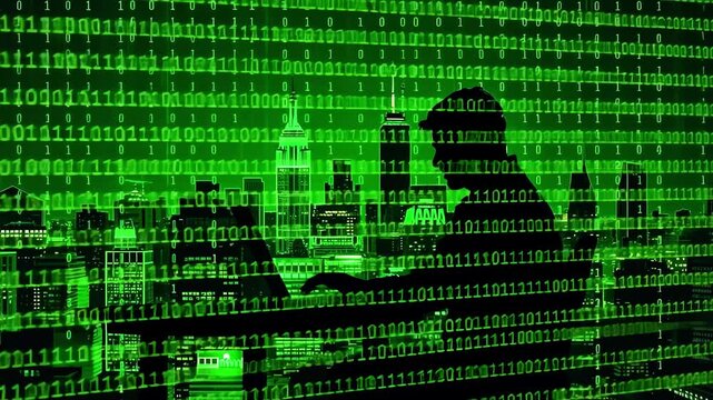 Silhouette of a person working on a laptop against a green digital city skyline background