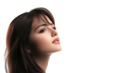 Woman with long flowing hair gazing upwards in thoughtful contemplation portrait