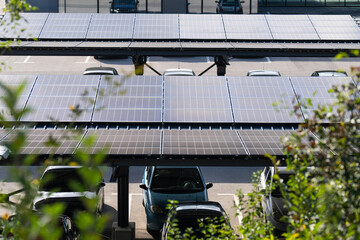 Parking space with solar panels on a roof. Solar canopy