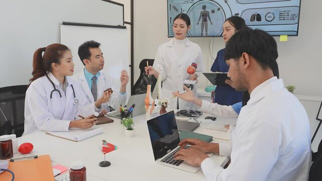 Asian medical team meeting About rickets and human internal organs, medical health concept