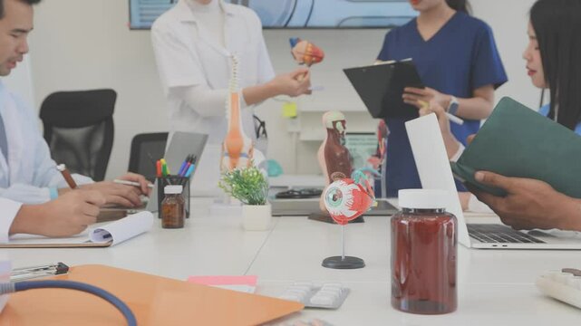 Asian medical team meeting About rickets and human internal organs, medical health concept