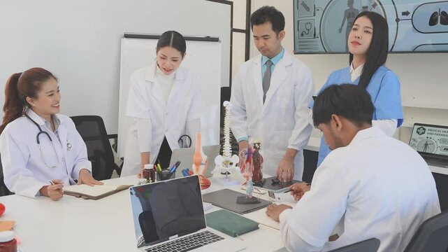 Asian medical team meeting About rickets and human internal organs, medical health concept