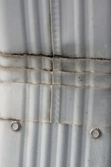 Close up of bend in a metal downspout