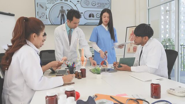 Asian medical team meeting About rickets and human internal organs, medical health concept
