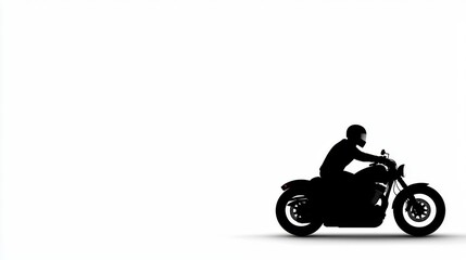A silhouette of a person riding a motorcycle