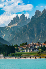 Naklejka premium Lake Auronzo. Mirror of the country and the Dolomites.