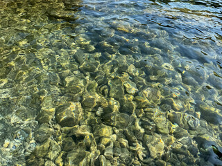 Stones and pebbles at the bottom of sea 