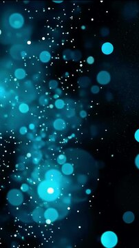 Abstract blue bokeh background with shimmering particles creating a dreamy atmosphere