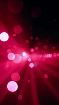Abstract vibrant pink and black background with glowing bokeh lights and rays of light streaming