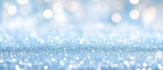 Abstract glittering light blue background with bokeh lights and space for text or design