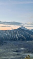 Majestic Mount Semeru and Bromo Hills at Sunrise – Misty Volcanic Landscape