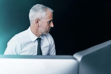 Mature man, computer and office for review, digital report and chief financial officer at agency....