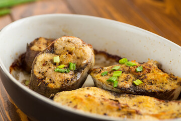 Baked fish with lemon and herbs