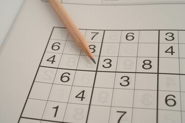 Sudoku puzzle, game to play for keep you brain younger for developing Alzheimer disease in senior patient.
