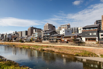 Fototapeta premium Japanese houses in Kamo River located in Kyoto Prefecture, Japan