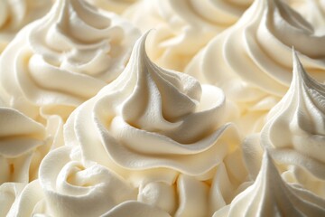 Obraz premium Whipped cream texture with delicate swirls and soft peaks