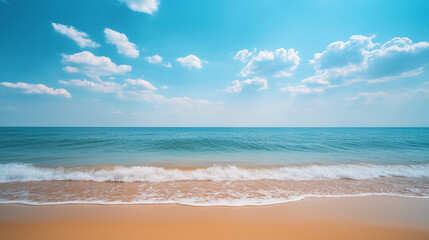 Obraz premium Serene tropical beach with gentle ocean waves under a bright blue sky—perfect for vacation themes, relaxation concepts, and travel promotions