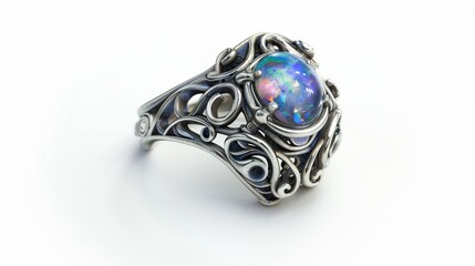 A silver Art Nouveau ring with an opal centerpiece, isolated on white. The swirling metal design and iridescent stone enhance beauty.