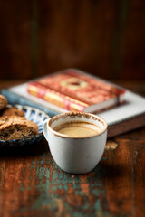 Cup of coffee and Cantuccini (Italian cookie) on dark wooden background. Copy space.	
