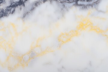 Elegant white and gold marble texture with subtle gray streaks