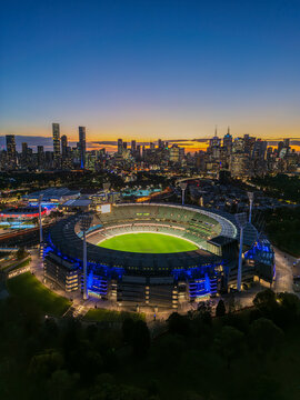 Melbourne, Australia &ndash; November 16, 2024: A stunning aerial shot of the Melbourne Cricket Ground (MCG) just after sunset, with the city skyline in the background. The iconic stadium stands as a symbol