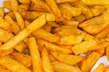 French fries on dish, fragment close-up