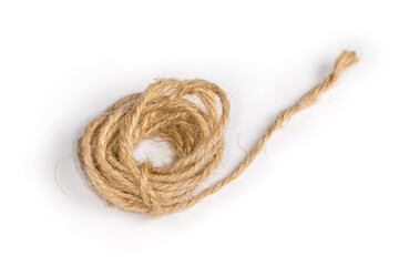 Small skein of natural twine on a white background