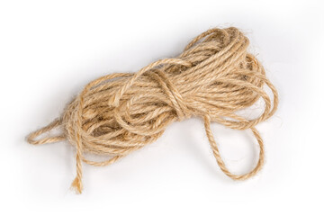 Small skein of natural twine on a white background