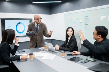 Male software developer, VR glasses system meeting in office with documents, laptop, sales...