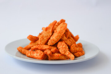 Spicy Basreng or fried meatball. Basreng is a typical snack from Sunda, Indonesia, made from fish balls which are thinly sliced ​​and then fried.