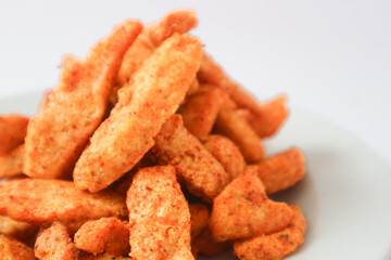 Spicy Basreng or fried meatball. Basreng is a typical snack from Sunda, Indonesia, made from fish balls which are thinly sliced ​​and then fried.