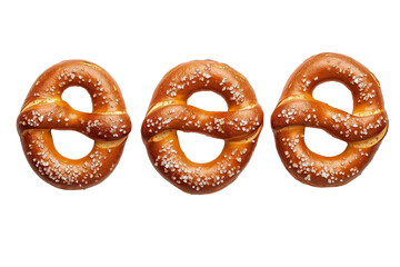 Set of three soft pretzels with coarse salt isolated on transparent white background