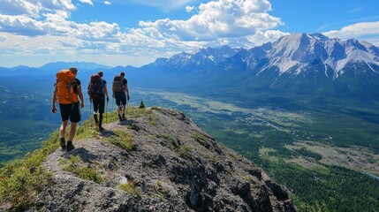Obraz premium A group of friends enjoying a scenic hike to a mountain summit, with breathtaking views of the valley below 