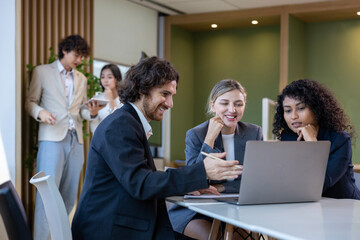 Team of diversity business people are discussing over the new strategic strategy project on investment real estate while working in modern office building for new project and planning