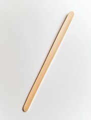 Obraz premium A small wooden toothpick for dental cleaning.