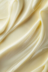 Background featuring a yellowish-white cream texture, resembling the rich, soft consistency of cream, soft butter, or mayonnaise. This versatile design can be used for beauty, skincare concepts, or fo